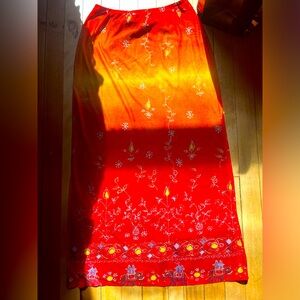 Vibrant orange and yellow print long skirt with lining